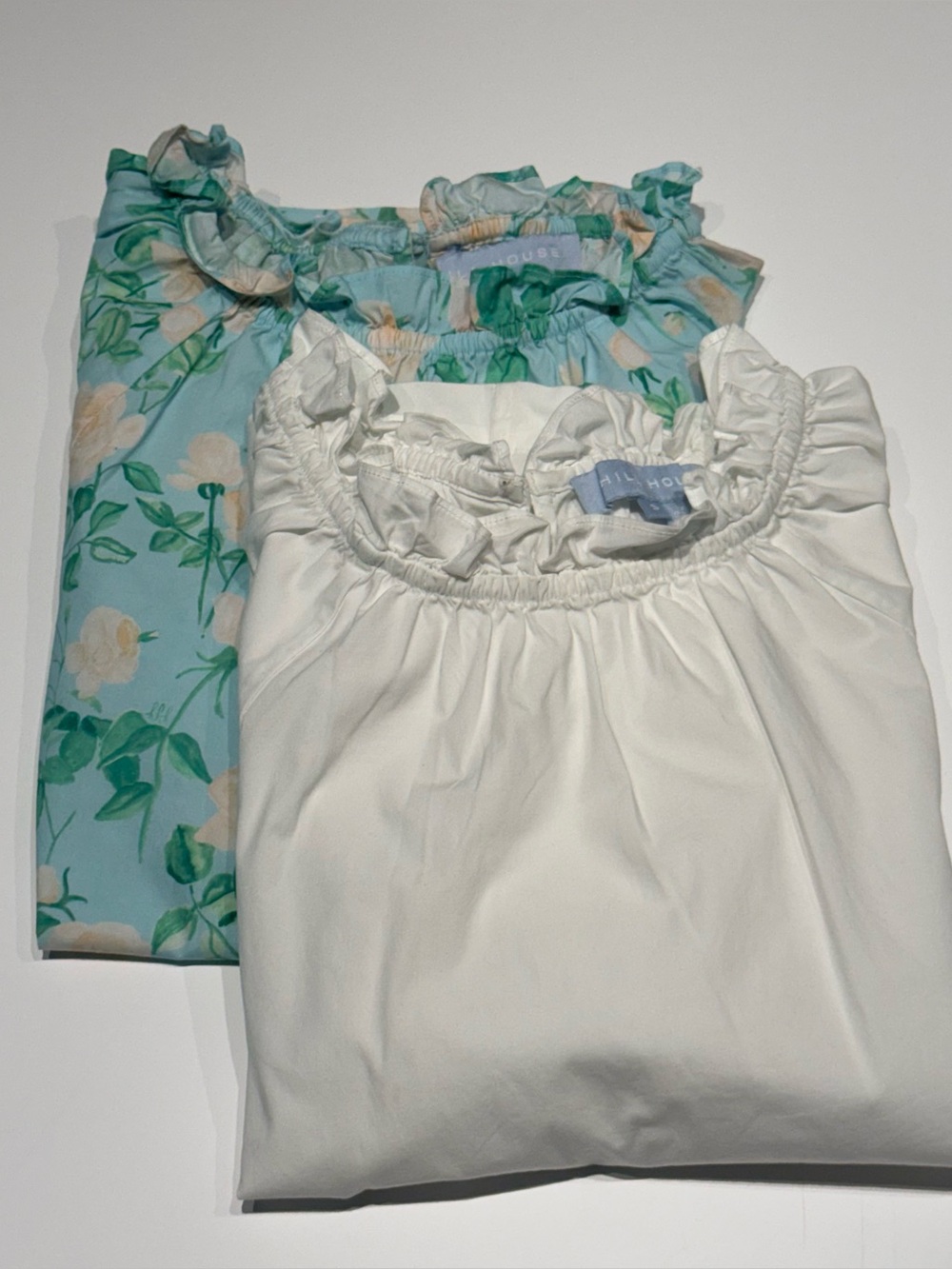 Pair of Women’s Hill House blouses. Floral - xs / white -s